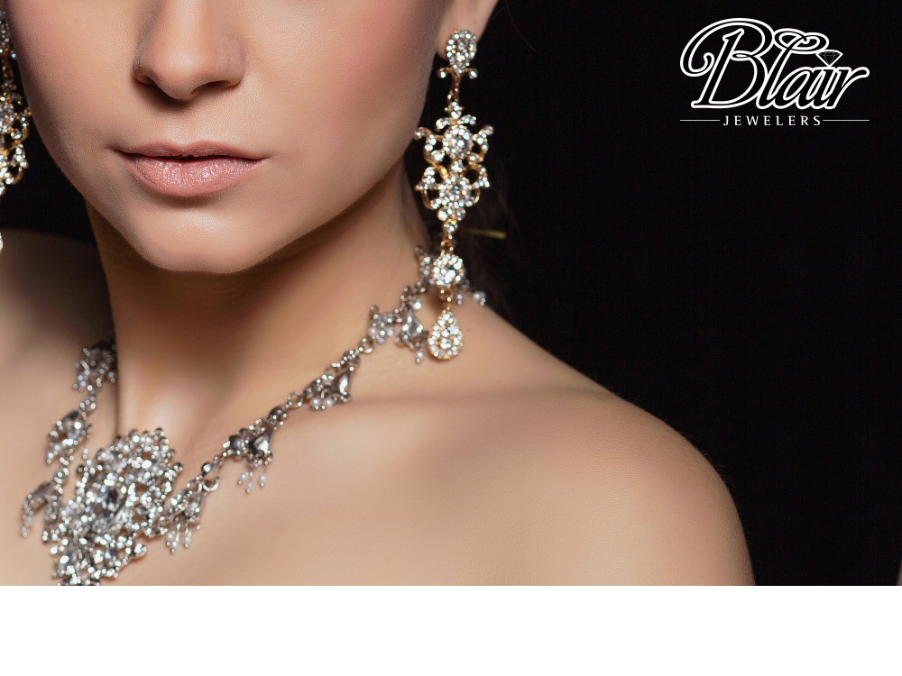 Blair Jewelers - diamond necklace and earrings on model